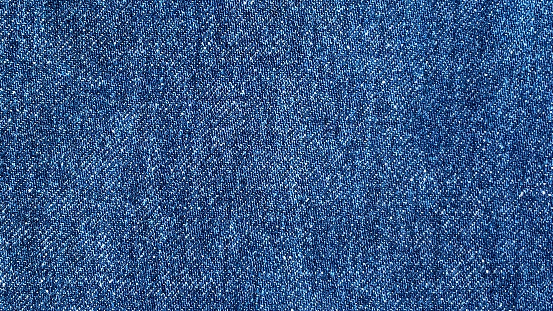 a close up of a blue jean fabric