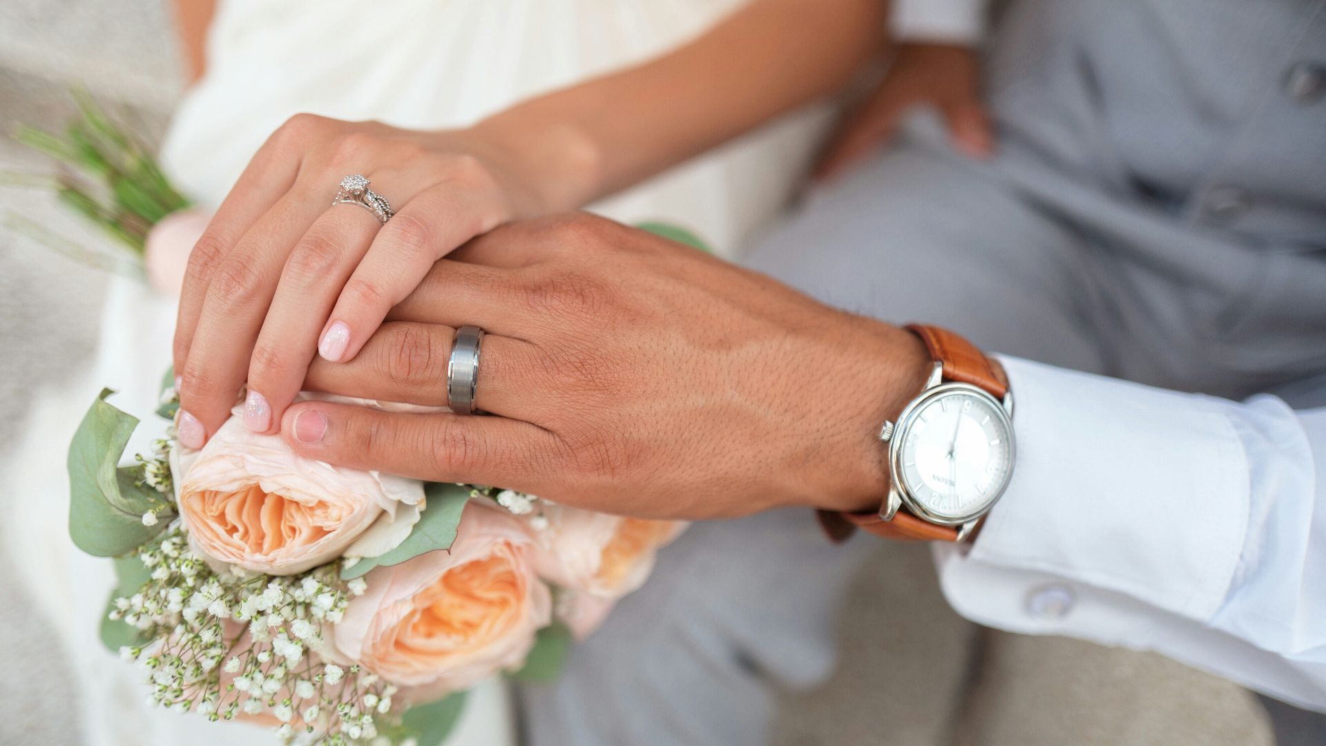man and woman holding hands