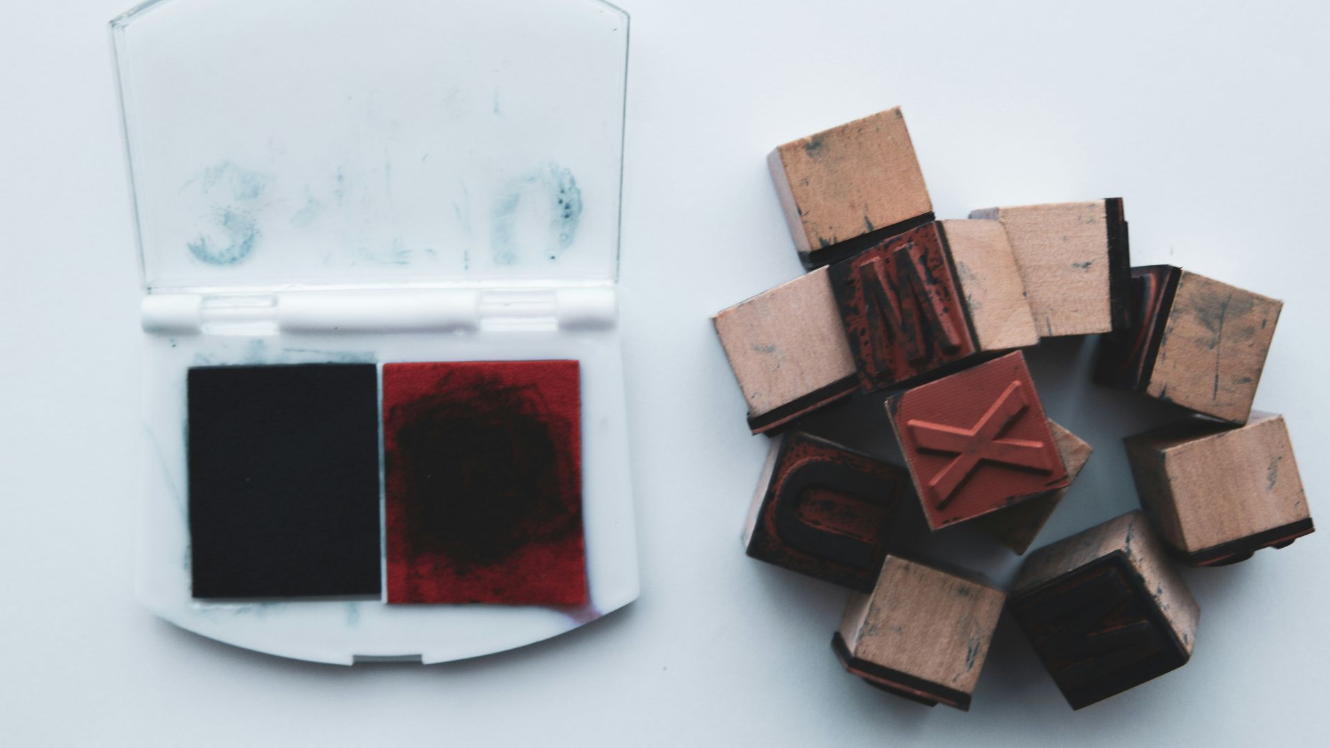 brown wooden blocks on white round container