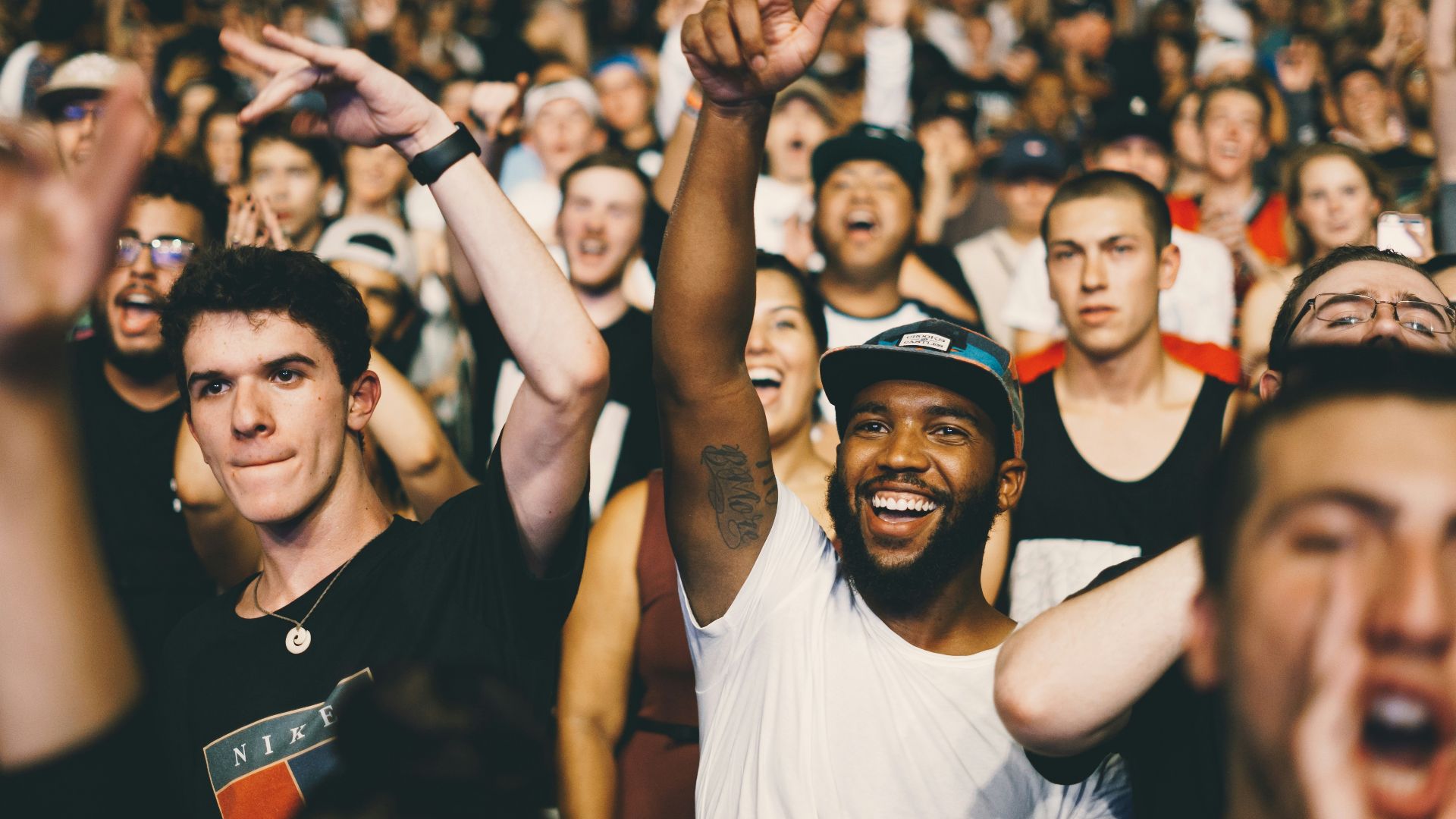 shallow focus photography of man in white shirt