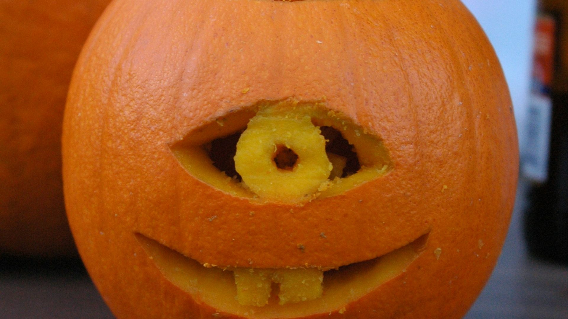 a carved pumpkin with a hole in it