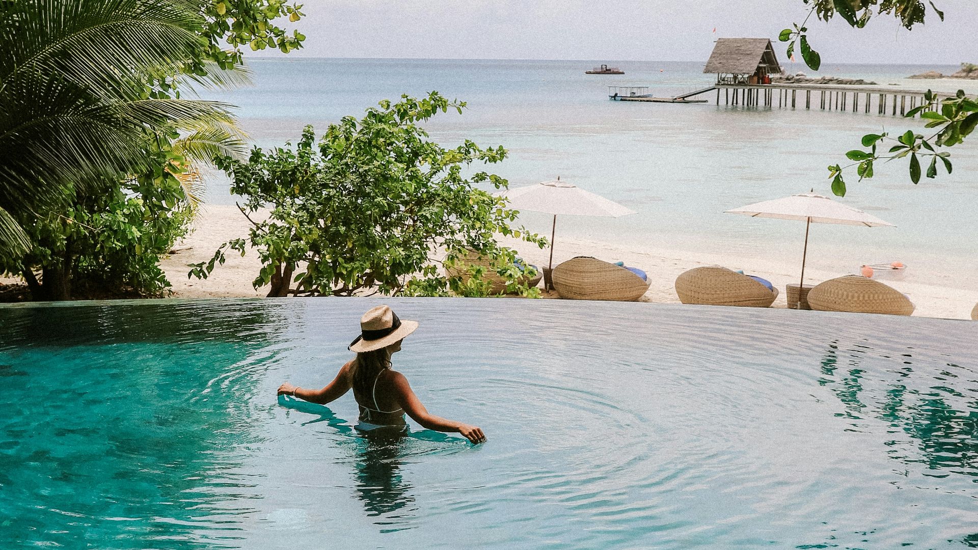 woman on body of water during daytime