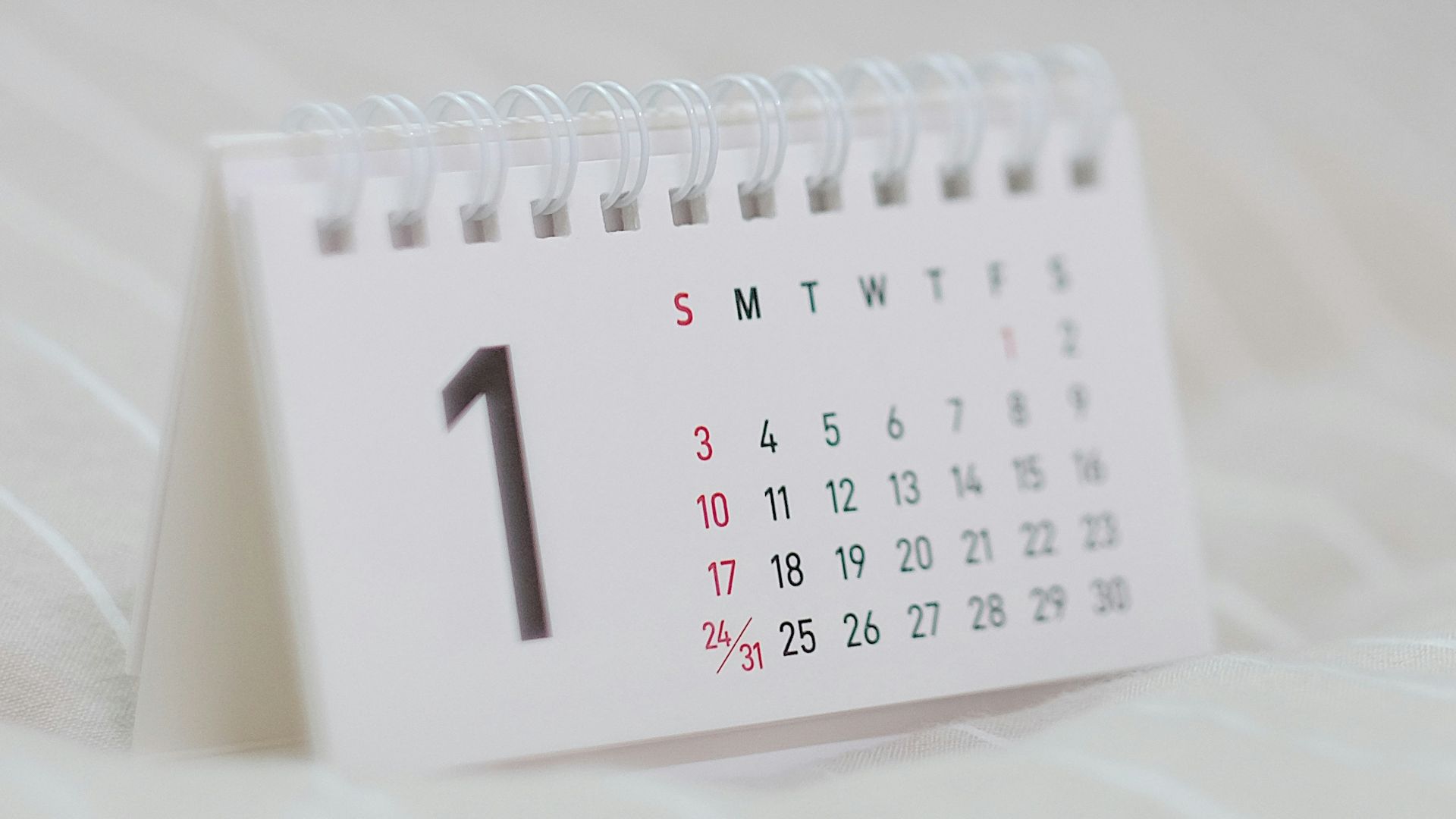 white calendar on white textile