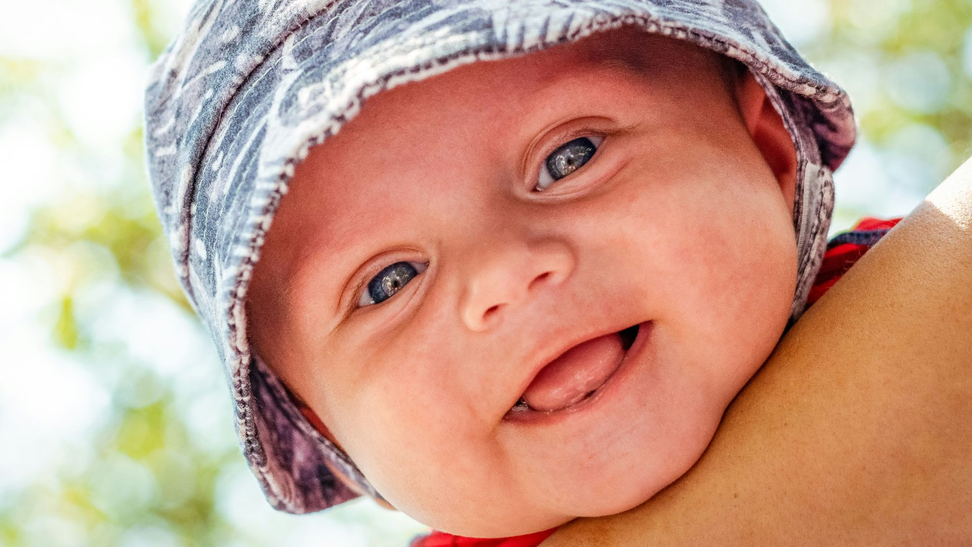child wearing gray knit cap