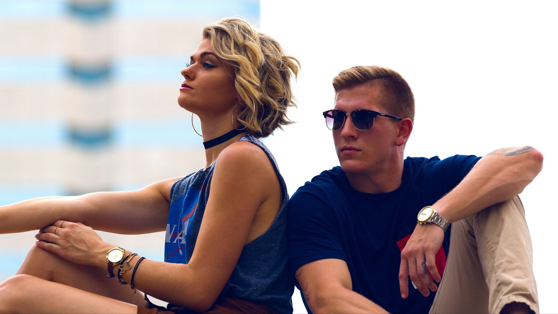 man and woman sitting posing for photo