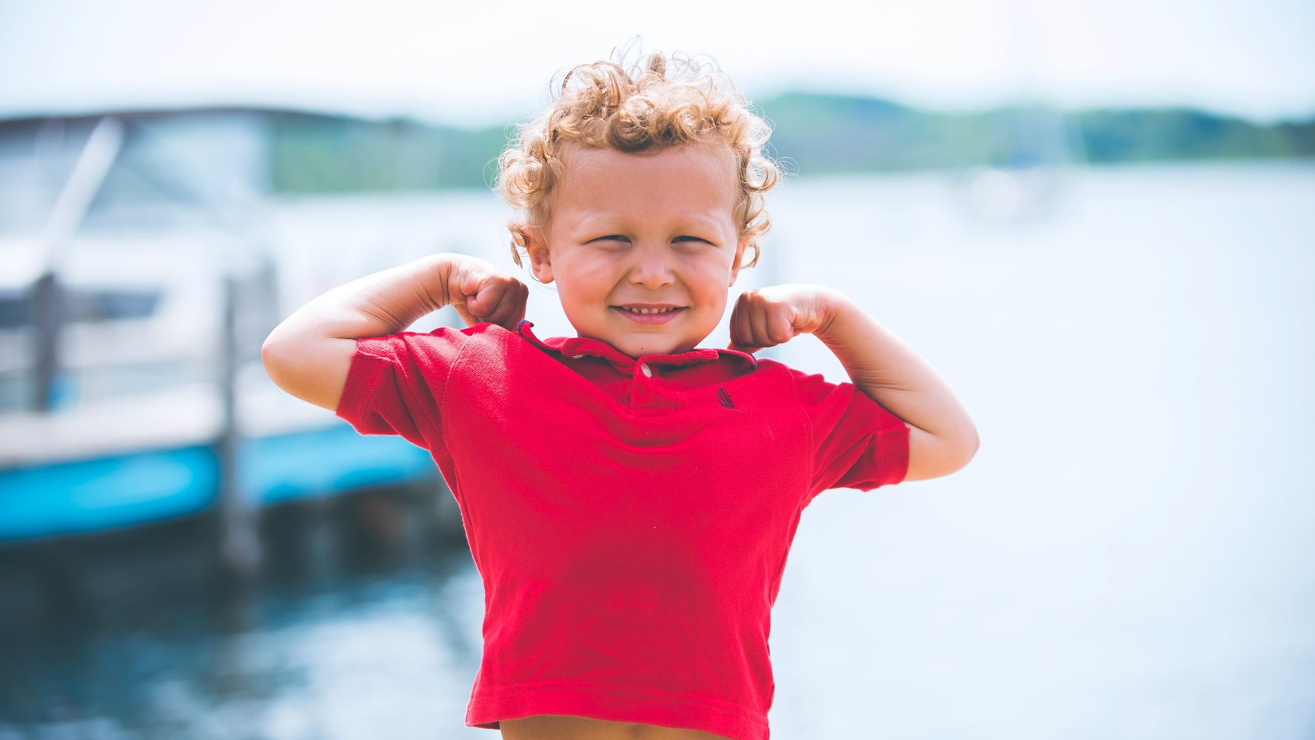 boy standing near dock