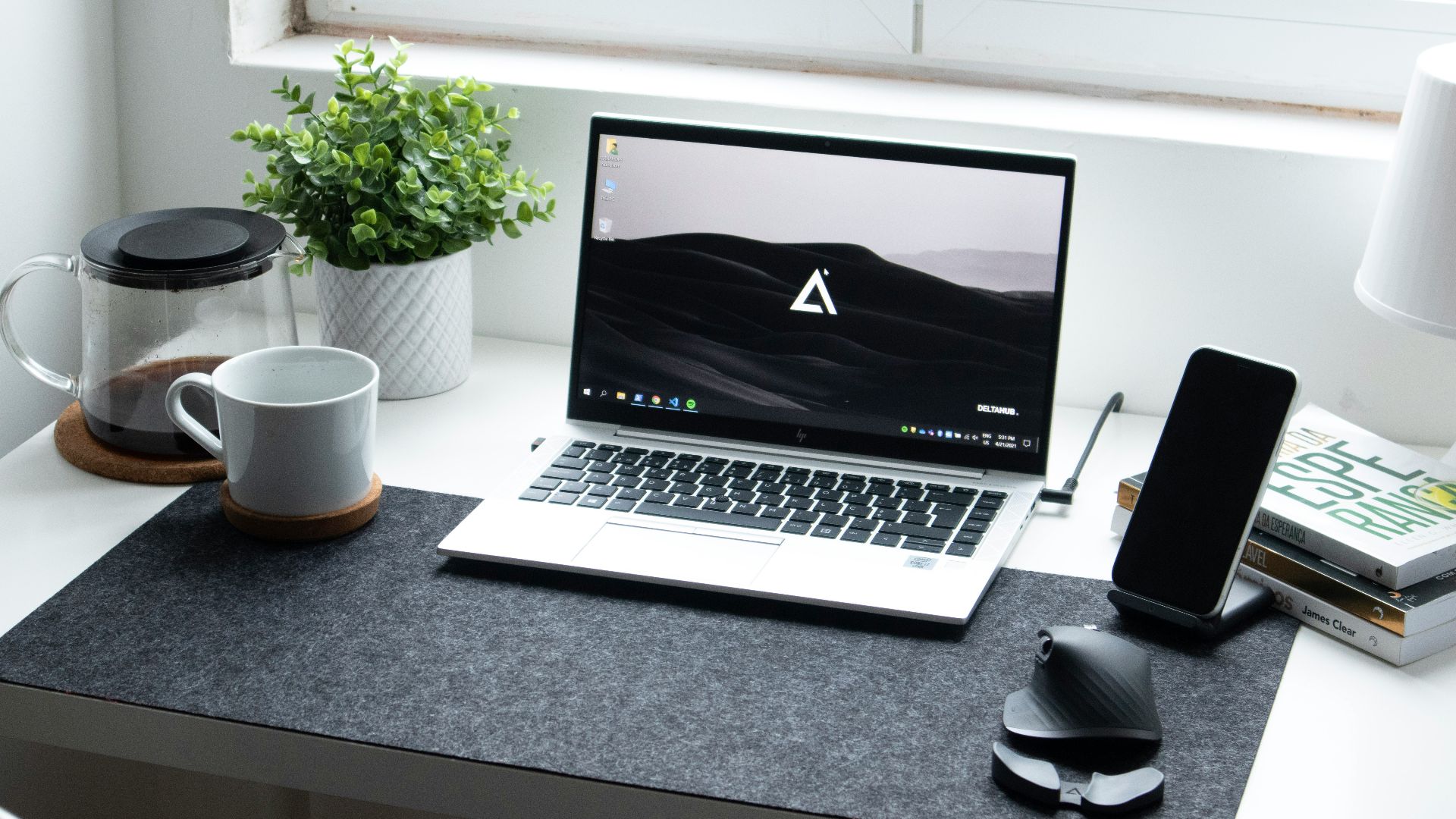 macbook pro on black table