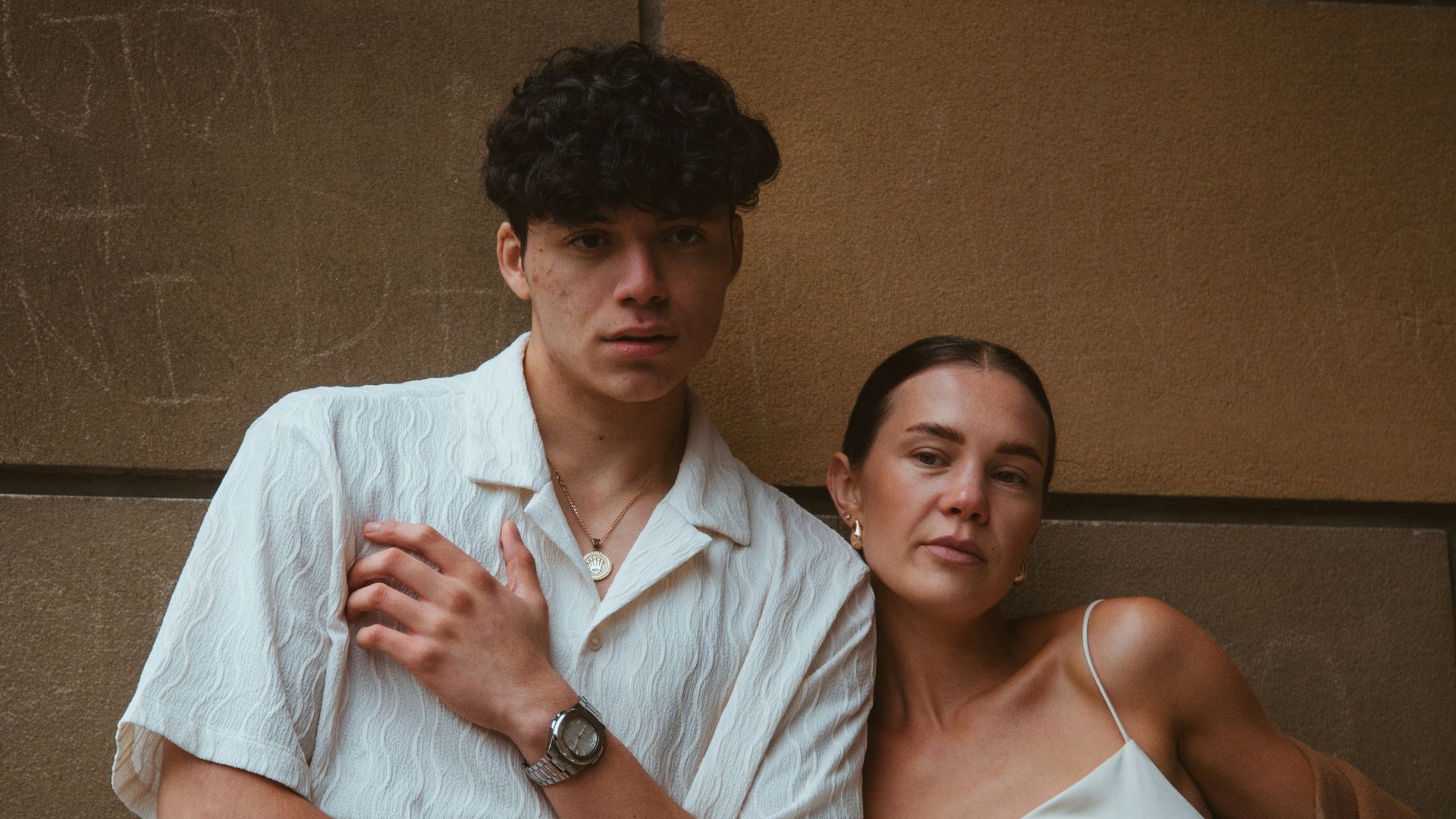 A man and a woman standing next to each other