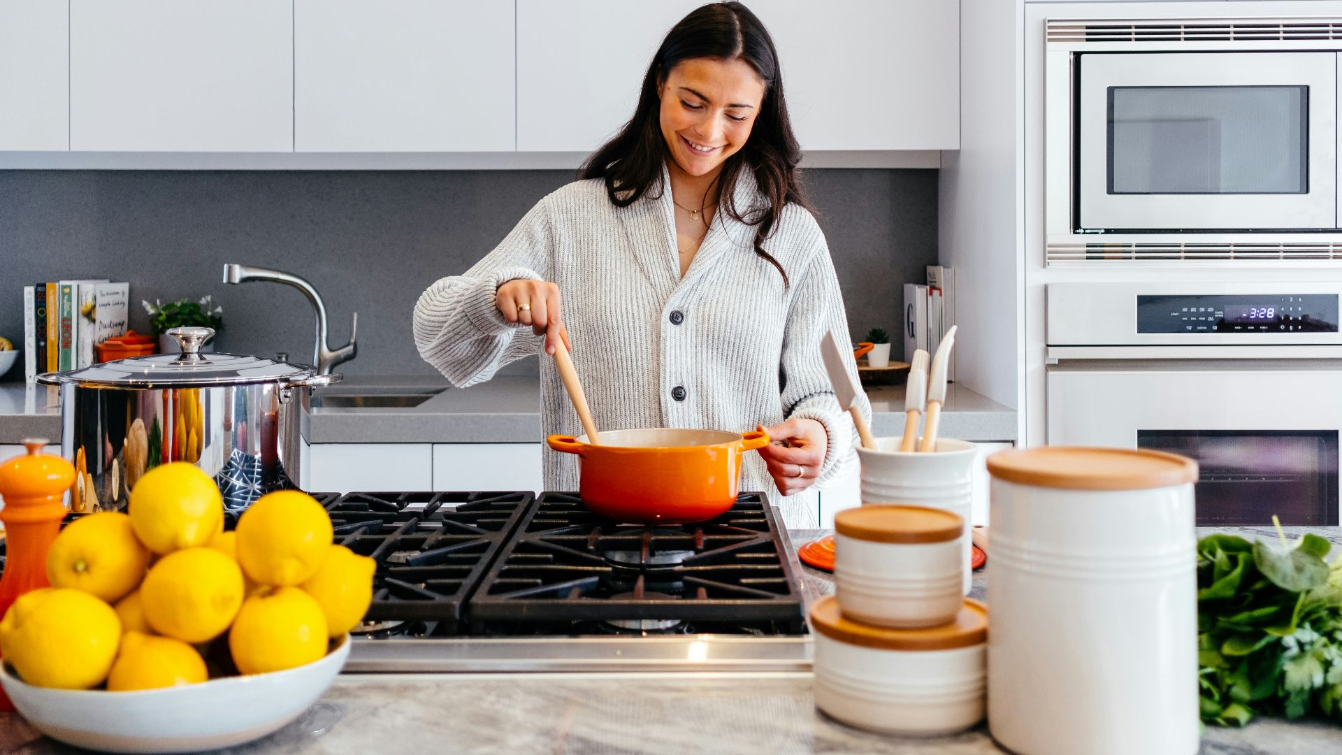woman cooking inside kitchen room