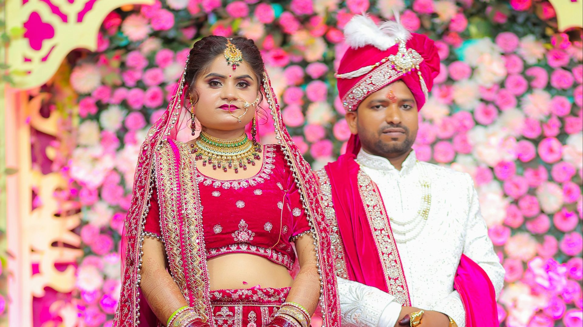 Bride and groom in traditional indian wedding attire