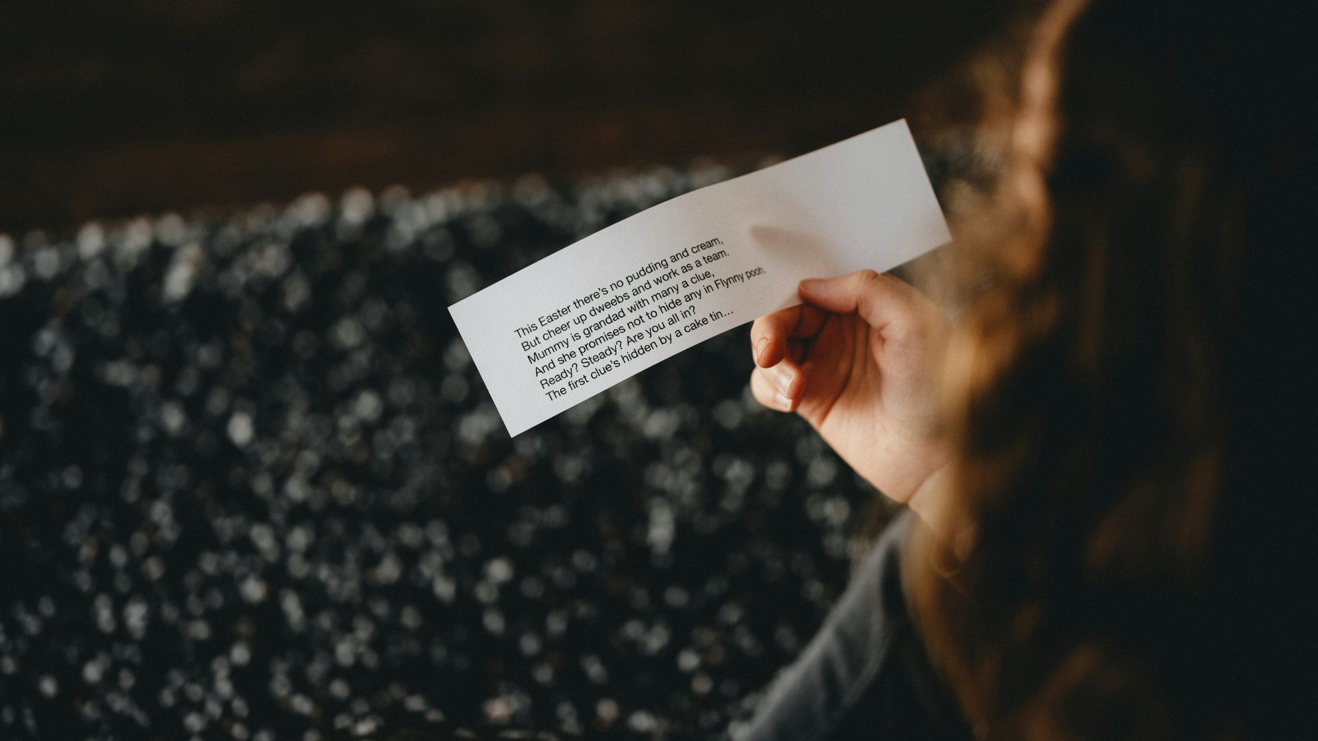 person holding white printer paper