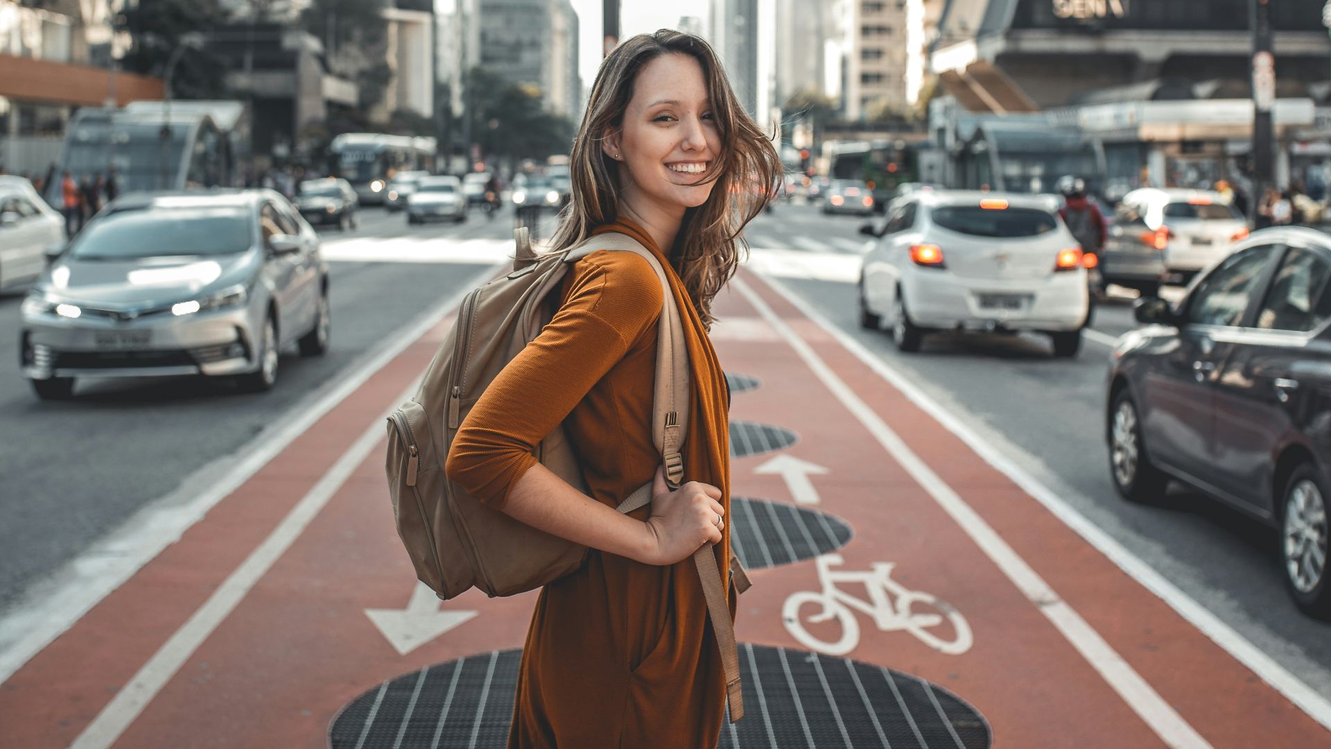 woman standing on middle of road