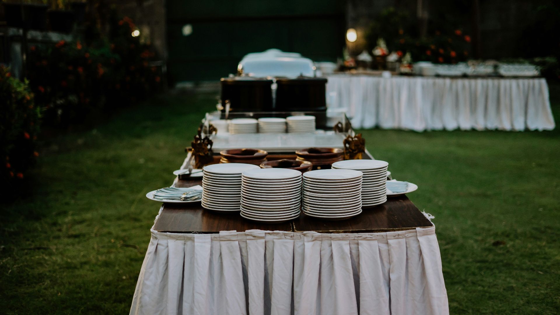 a table set up with plates and plates on it