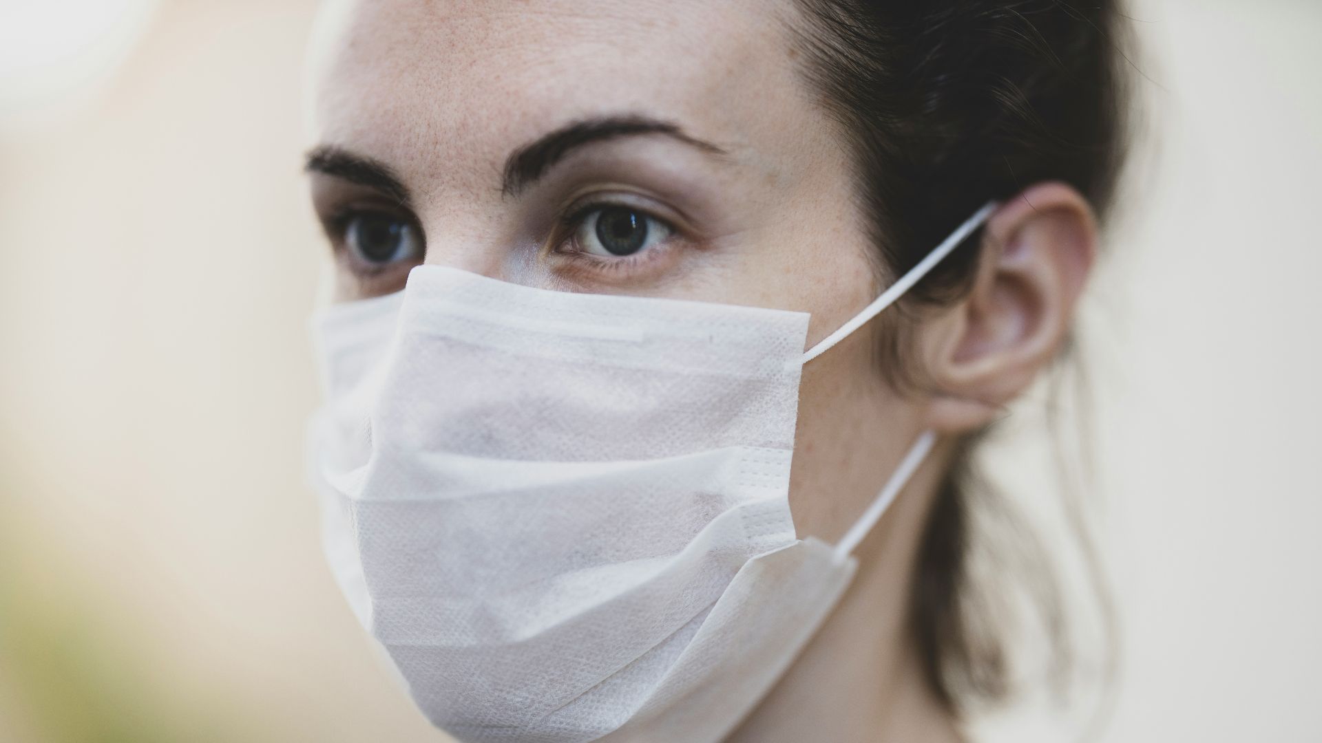 woman with white face mask