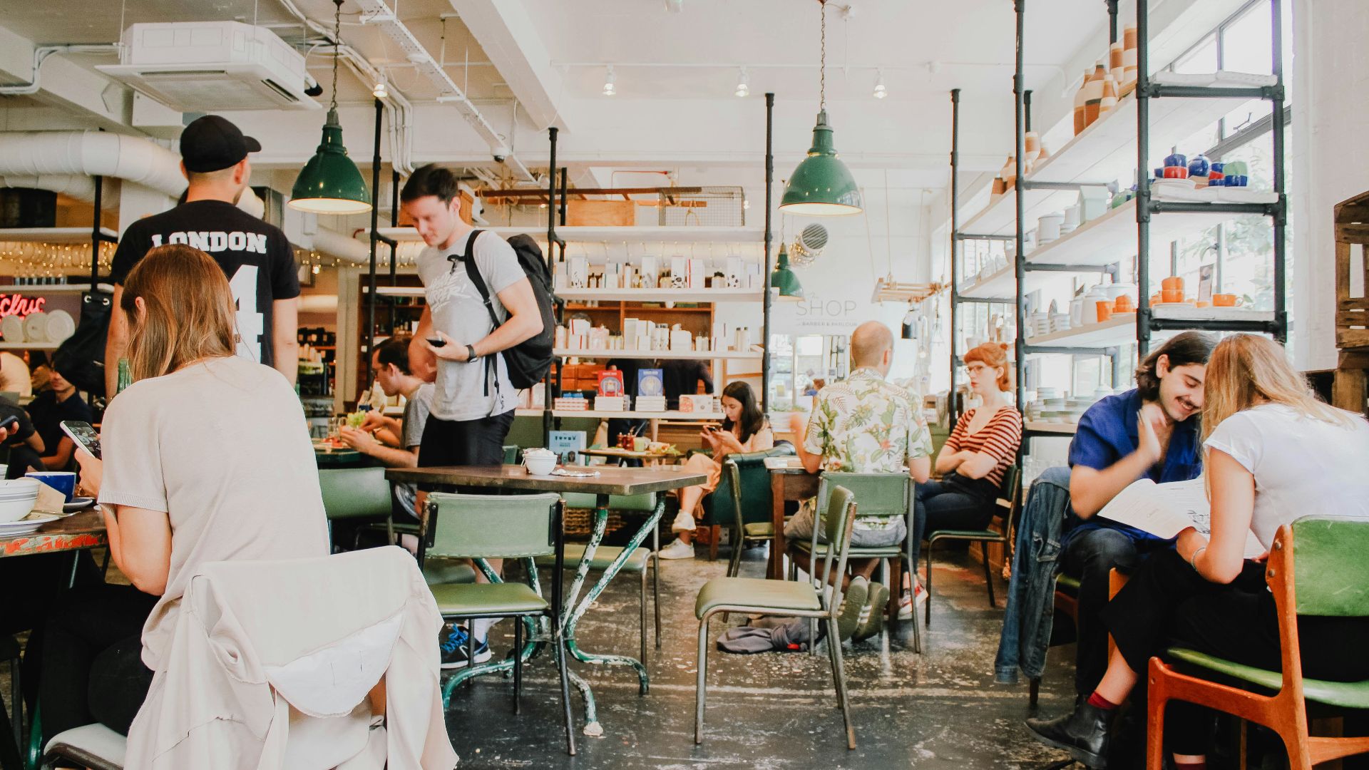 people eating inside of cafeteria during daytime