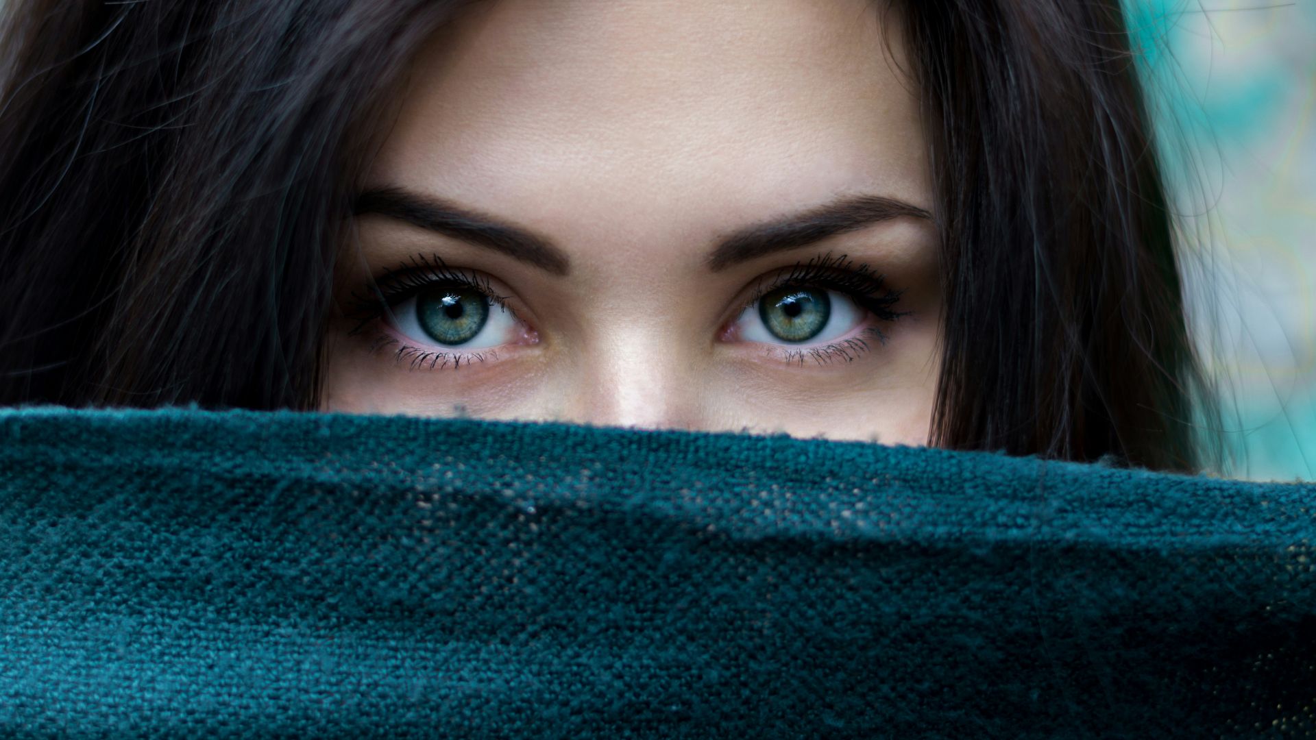 a close up of a person with blue eyes