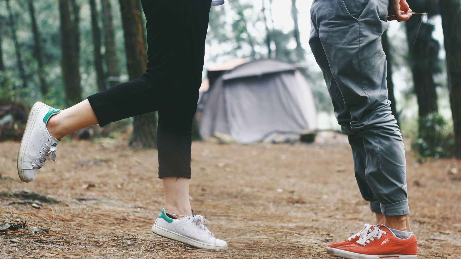 person's standing on brown sand during daytime