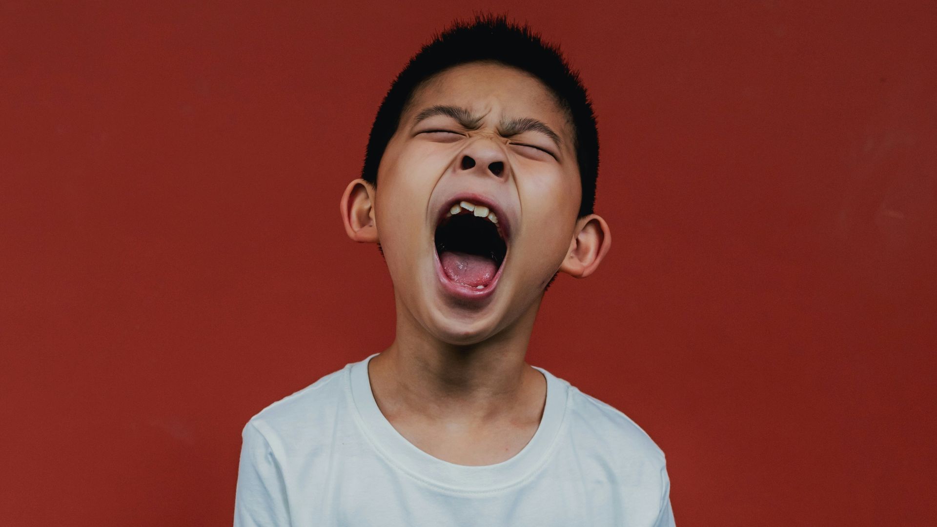 boy in white crew neck t-shirt