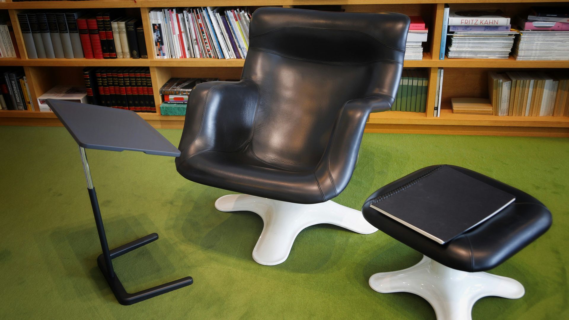 a chair and a table in a library