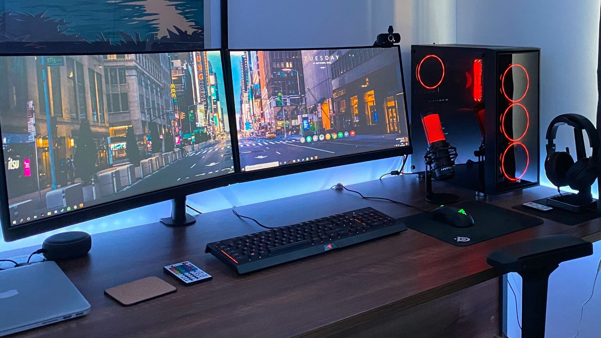 black flat screen computer monitor on brown wooden desk