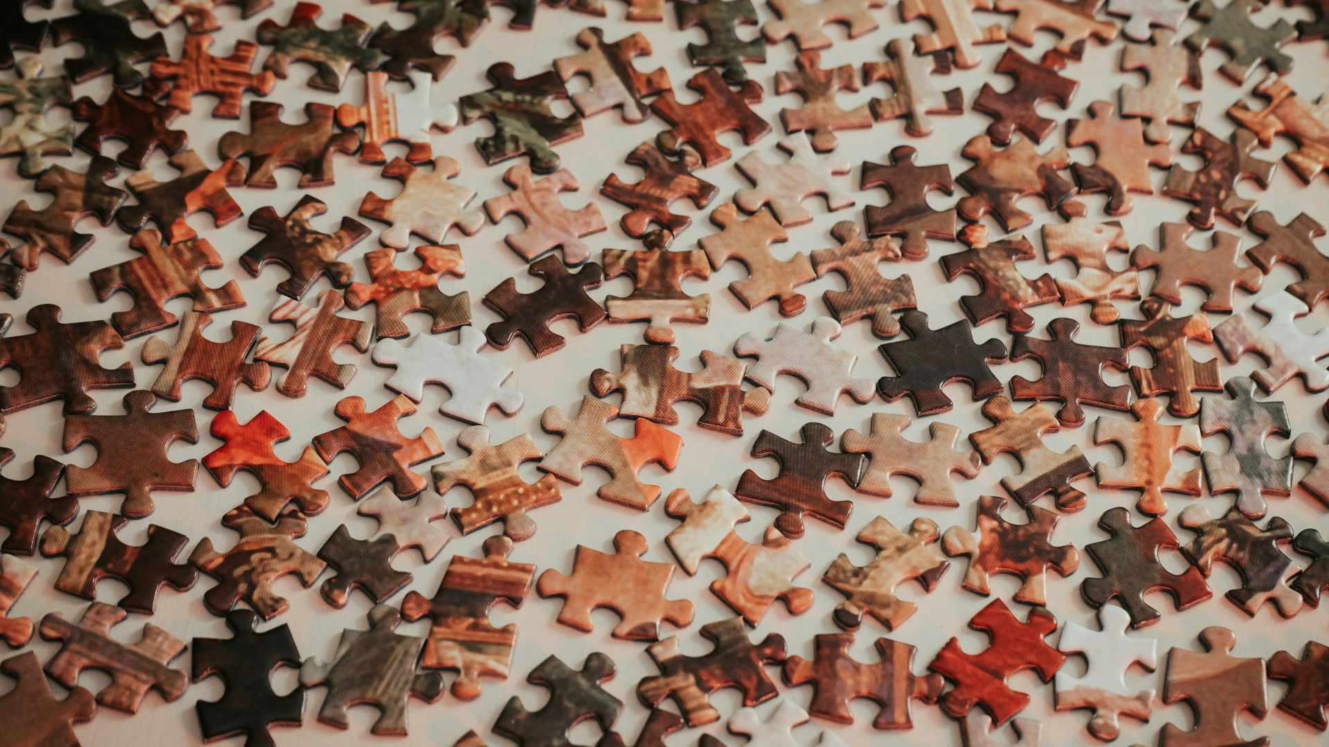 a close up of a puzzle on a table