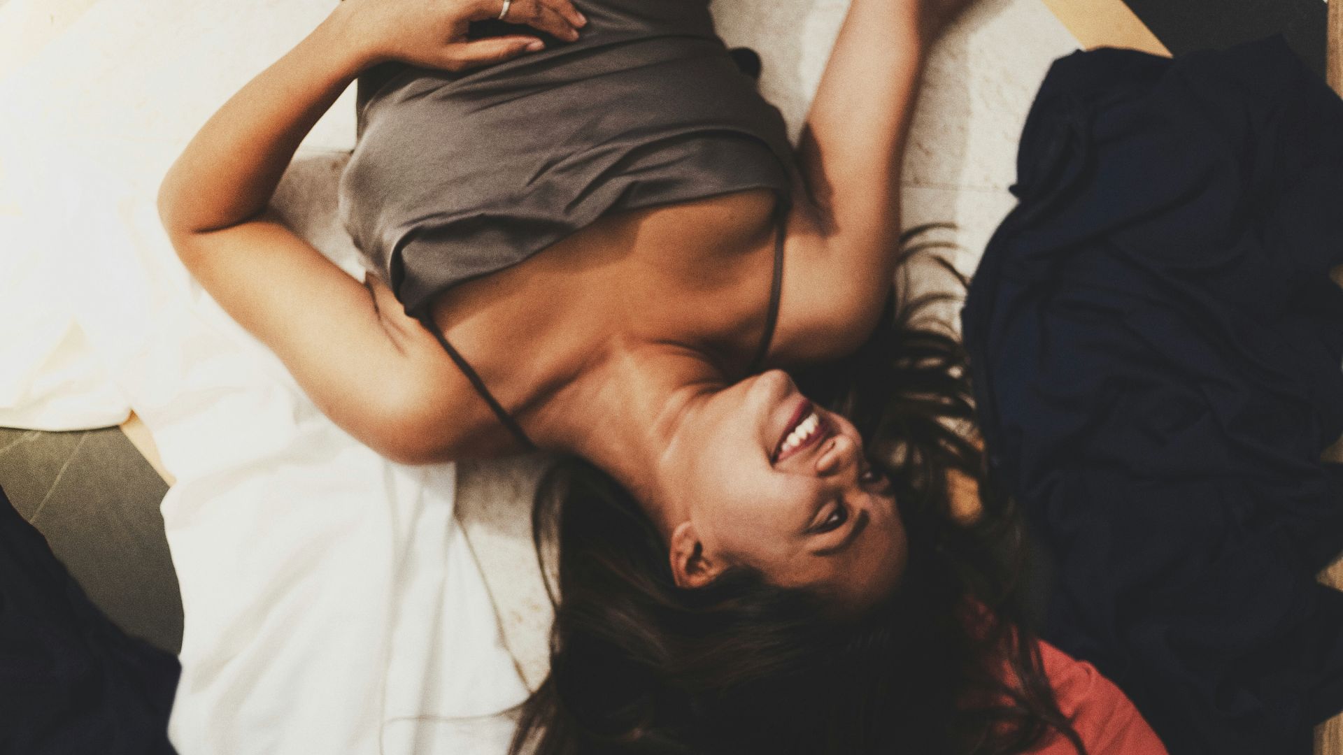 a person lying on a bed