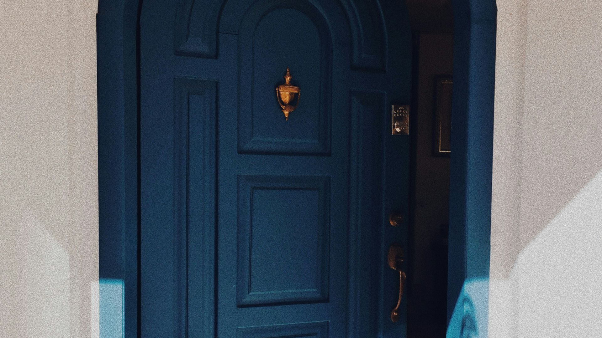 blue wooden door opened