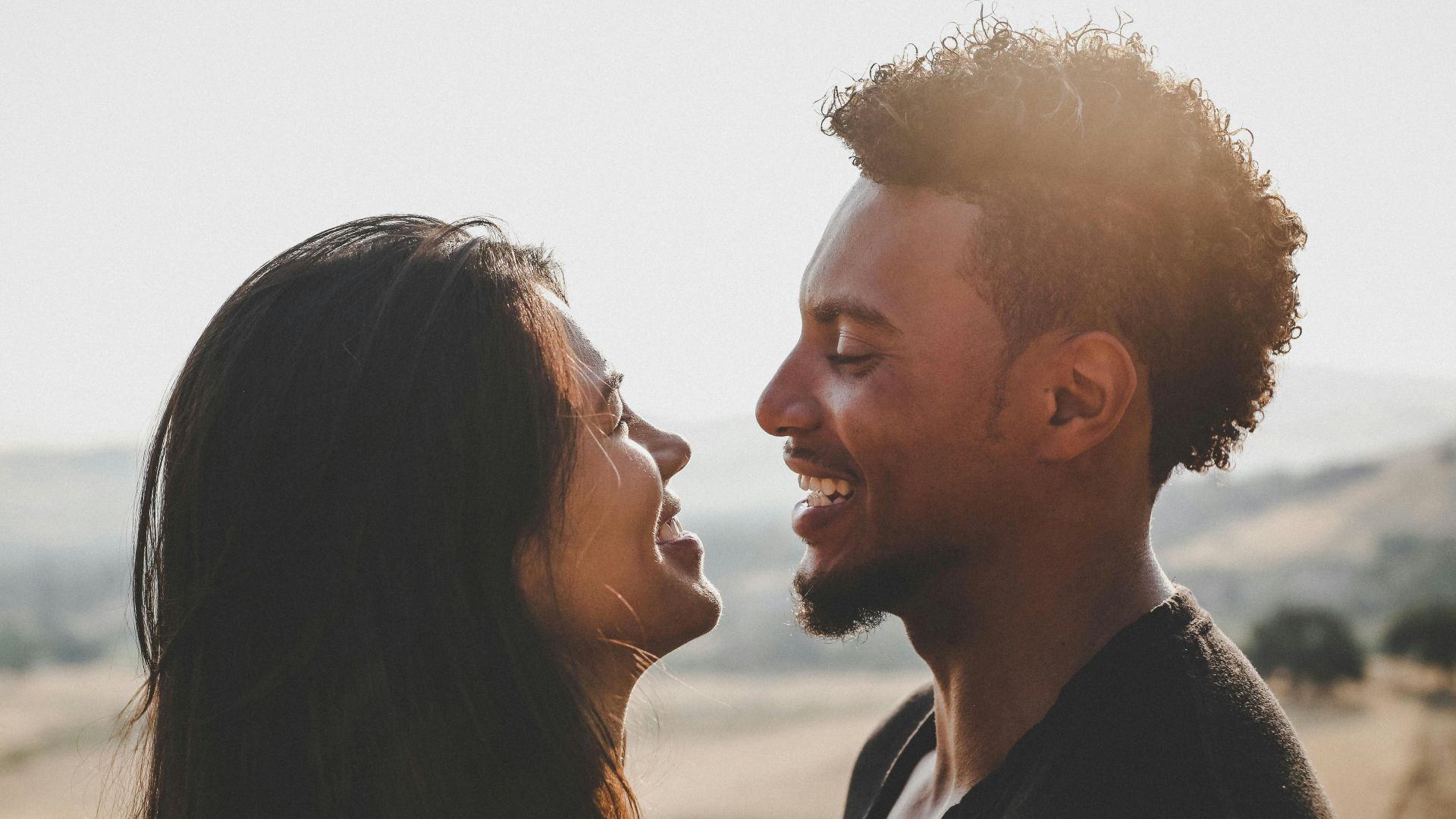 man and woman facing