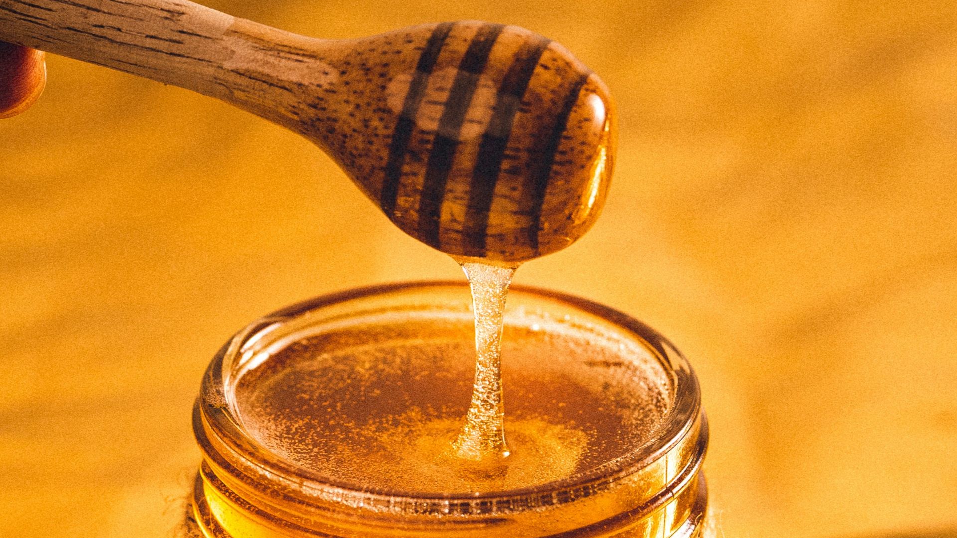 clear glass jar with brown liquid