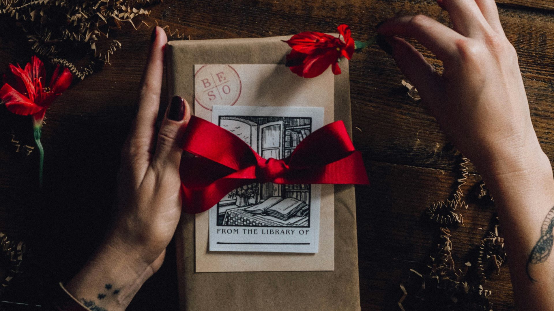 red ribbon on white greeting card