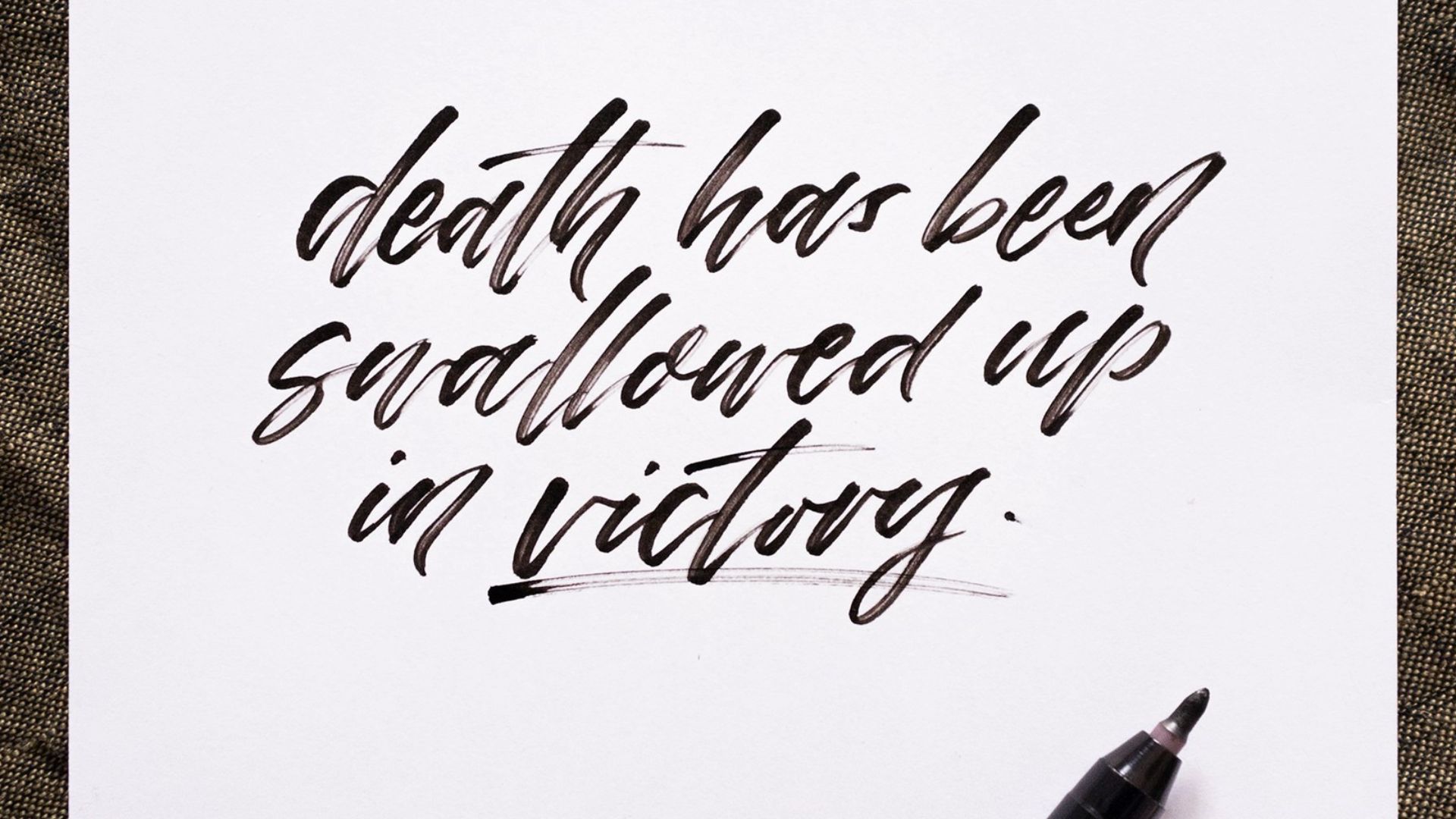 black pen on white paper