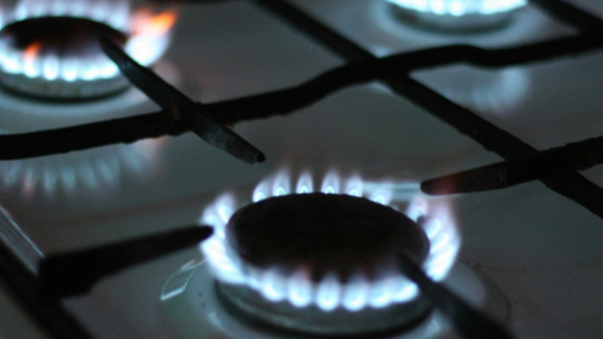 black gas stove with white and black gas stove