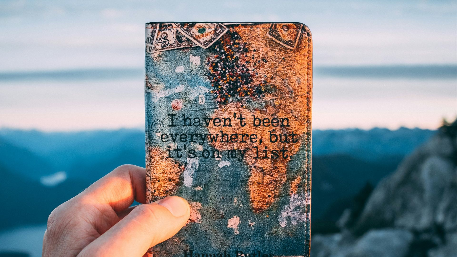 person holding I haven't been everywhere but it's on my list card