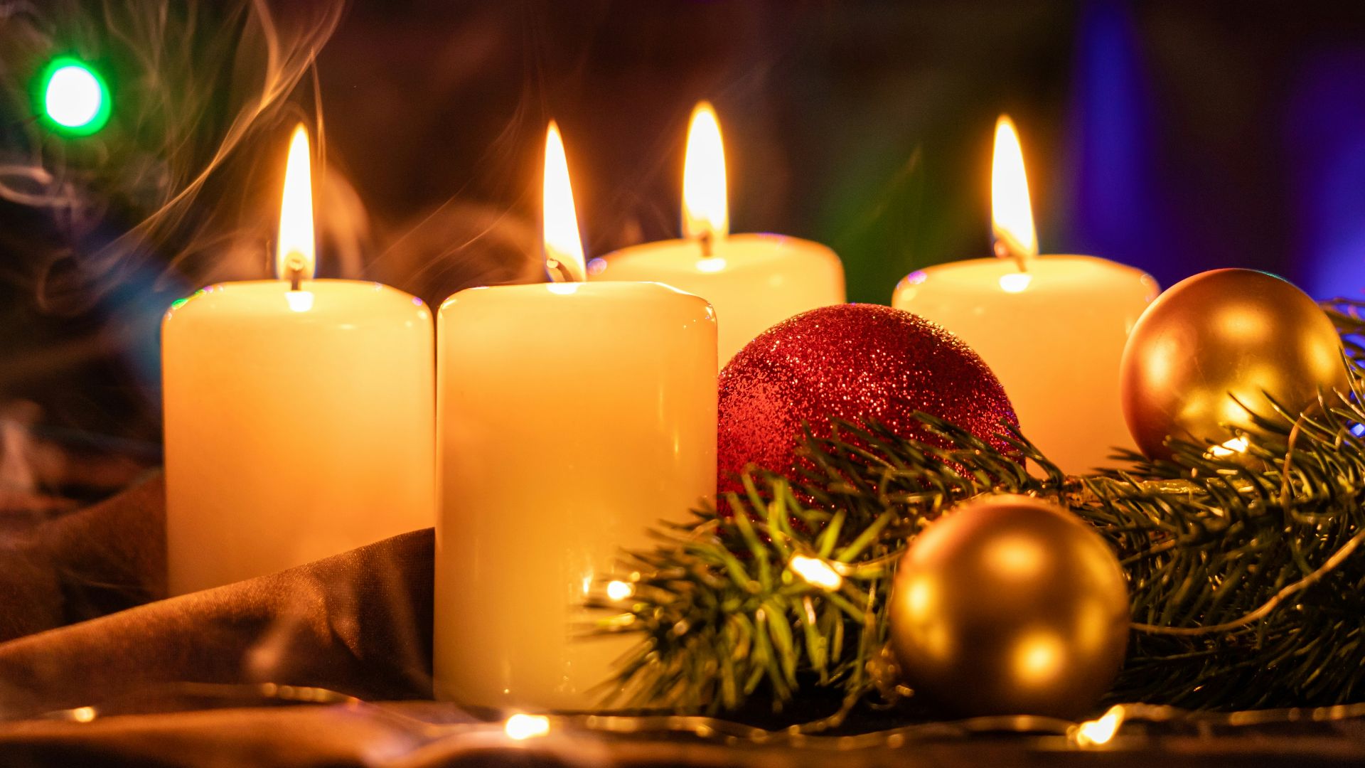 white candles on brown wooden table