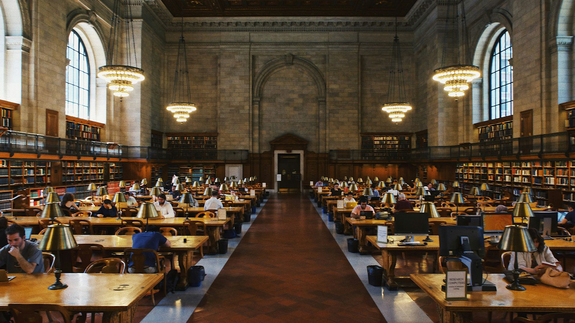 group of people inside the library