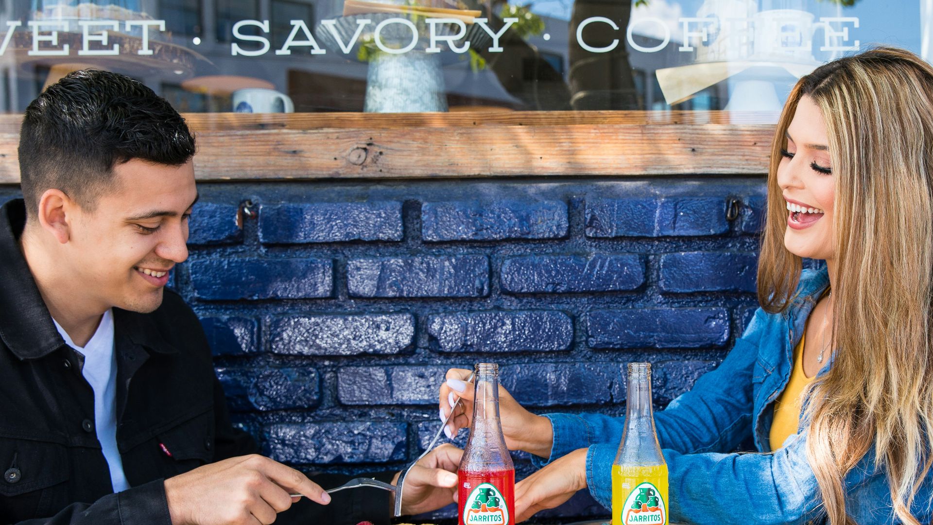 man and woman sitting at table