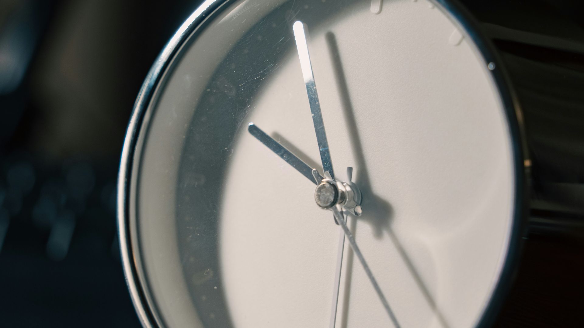 a close up of a clock on a table