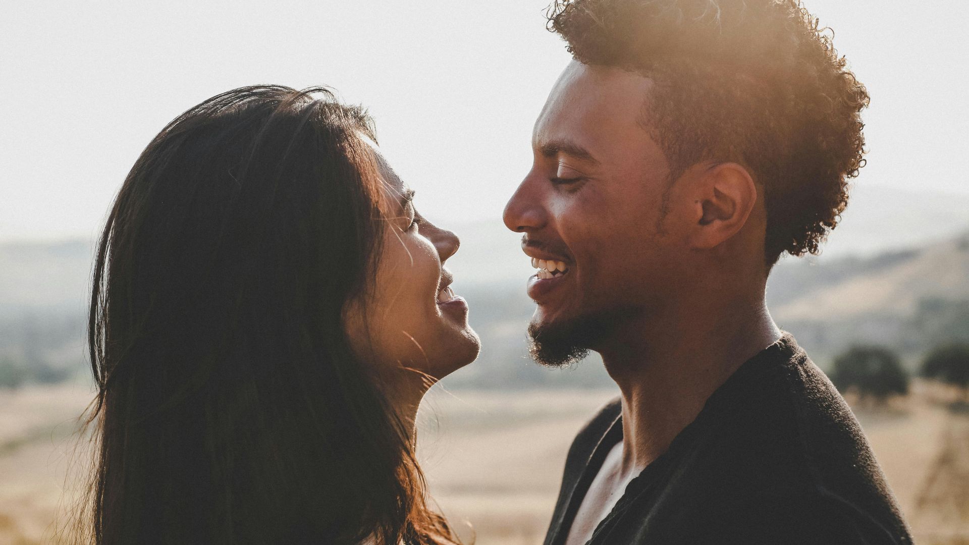 man and woman facing