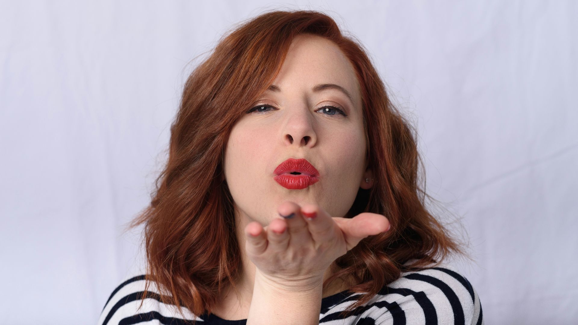girl in black and white striped shirt