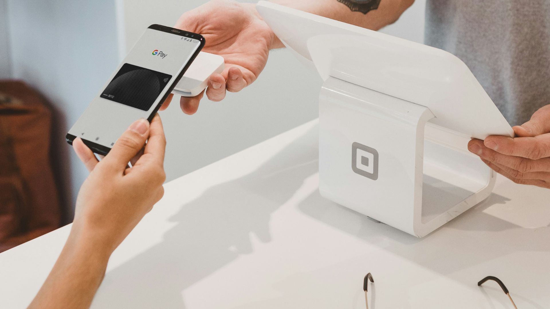 person holding black Android smartphone close-up photography