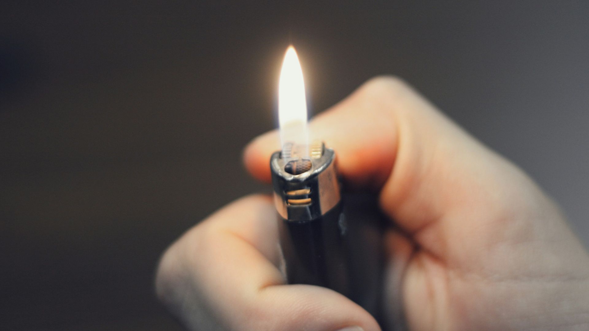 person holding black lighter