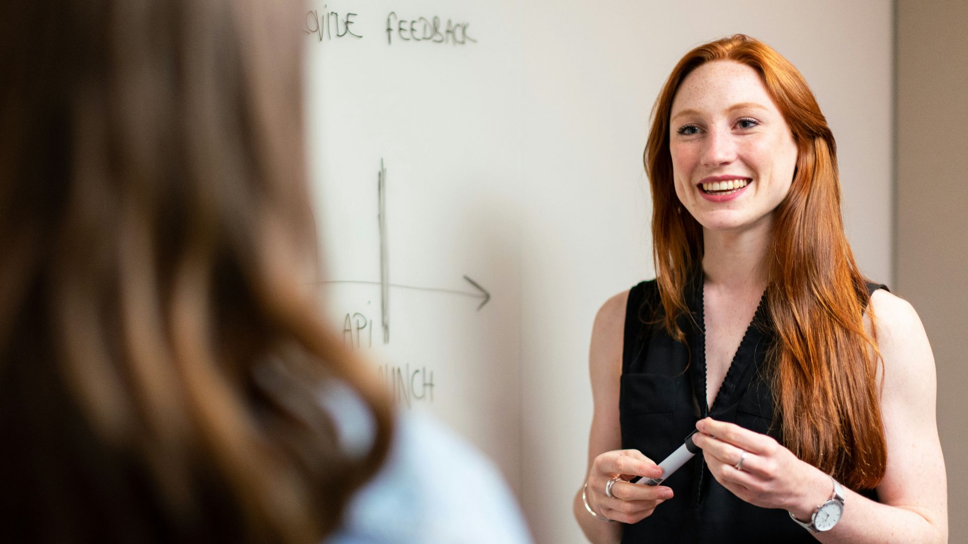 woman in black sleeveless top