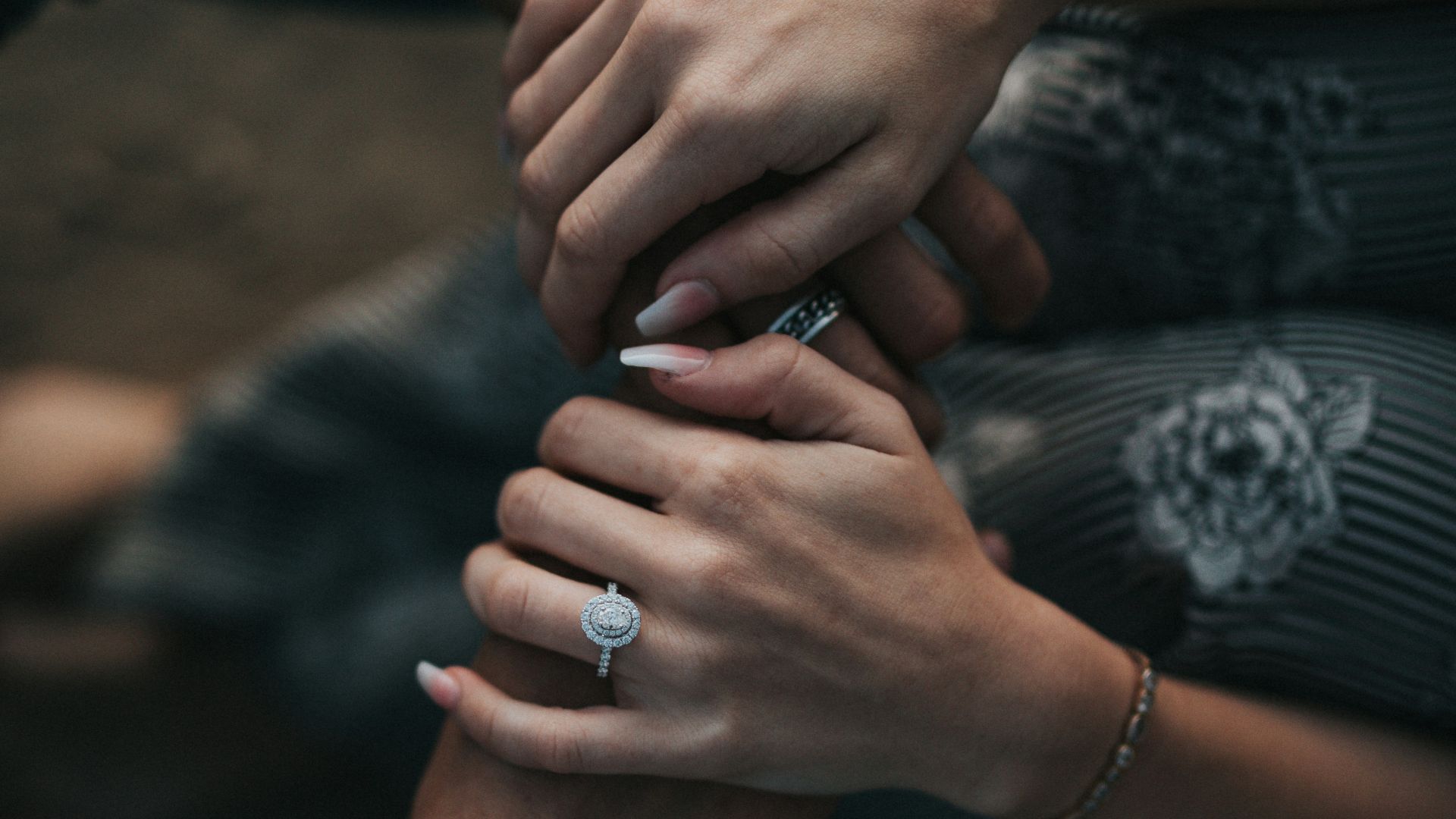 man and woman holding each others hands