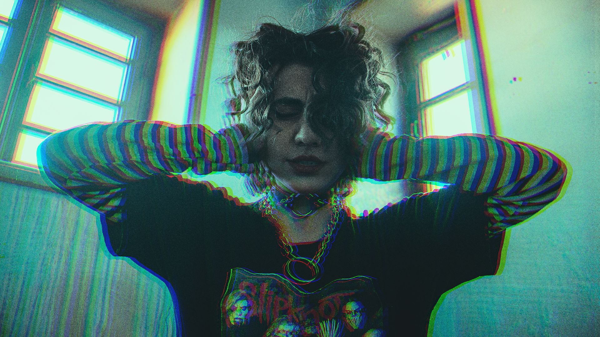 woman in blue and black striped long sleeve shirt