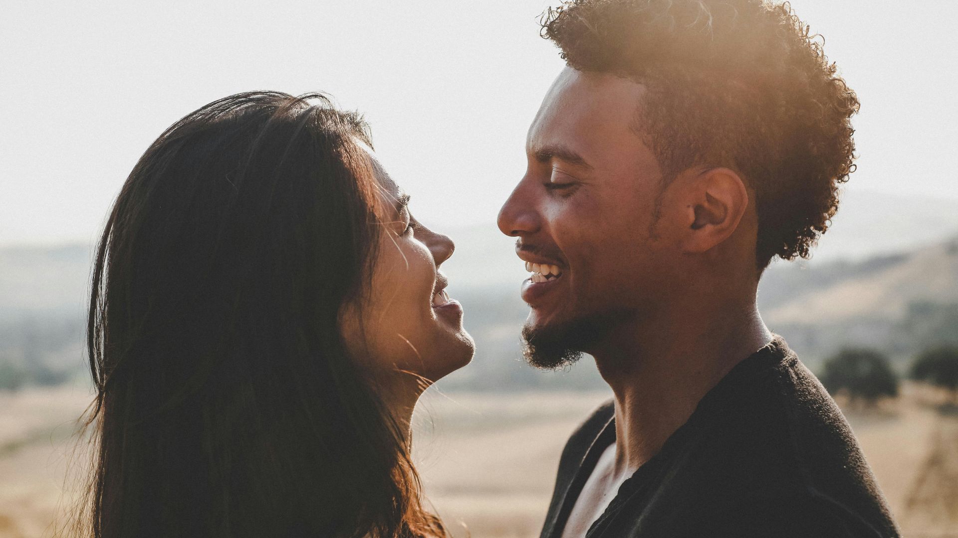 man and woman facing