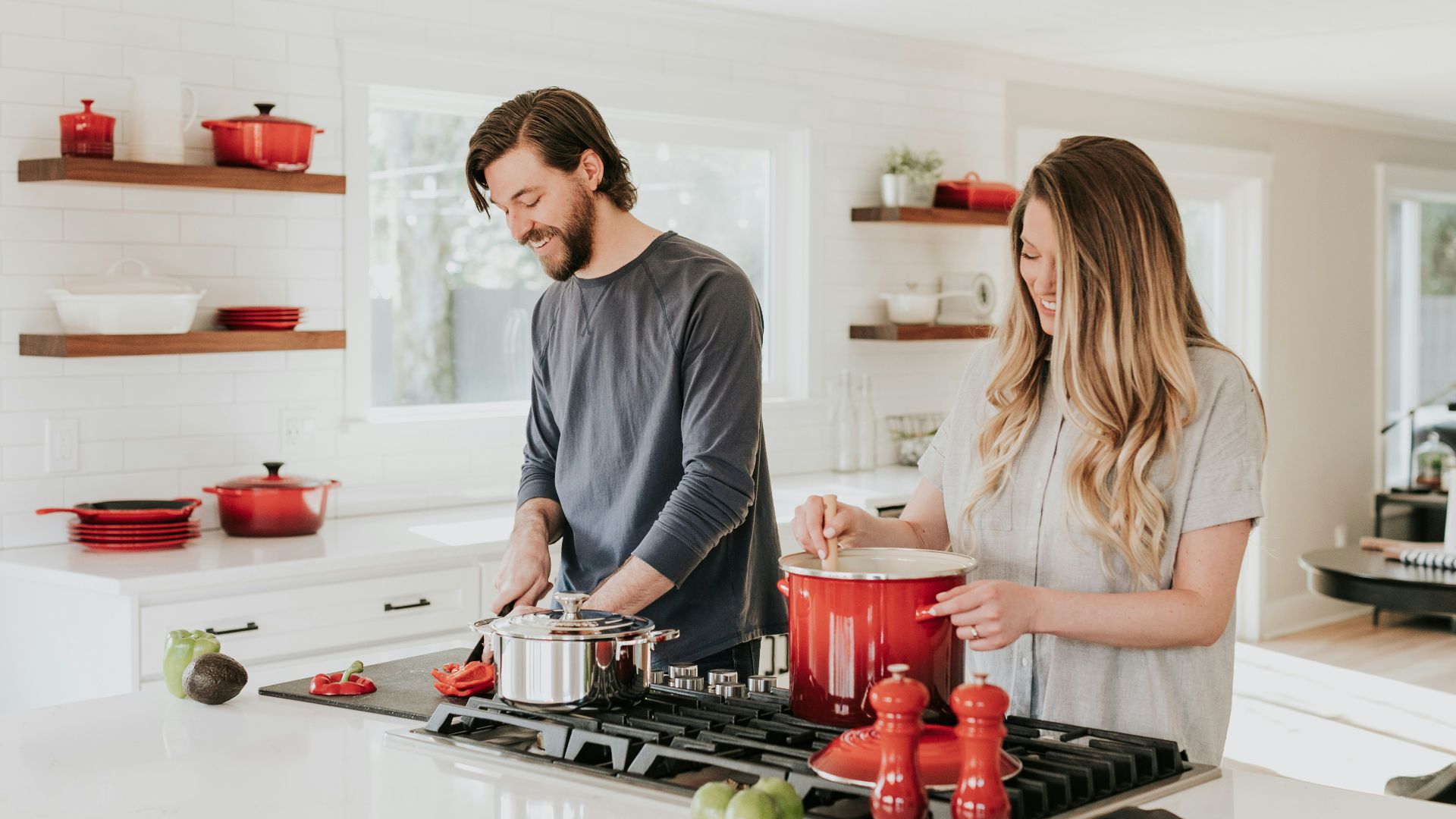 man and woman on kitchen
