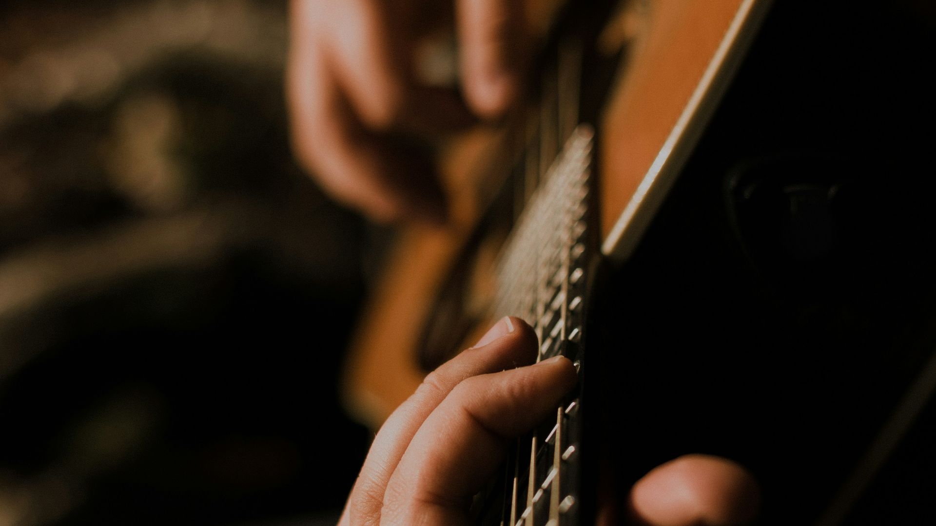 person playing guitar
