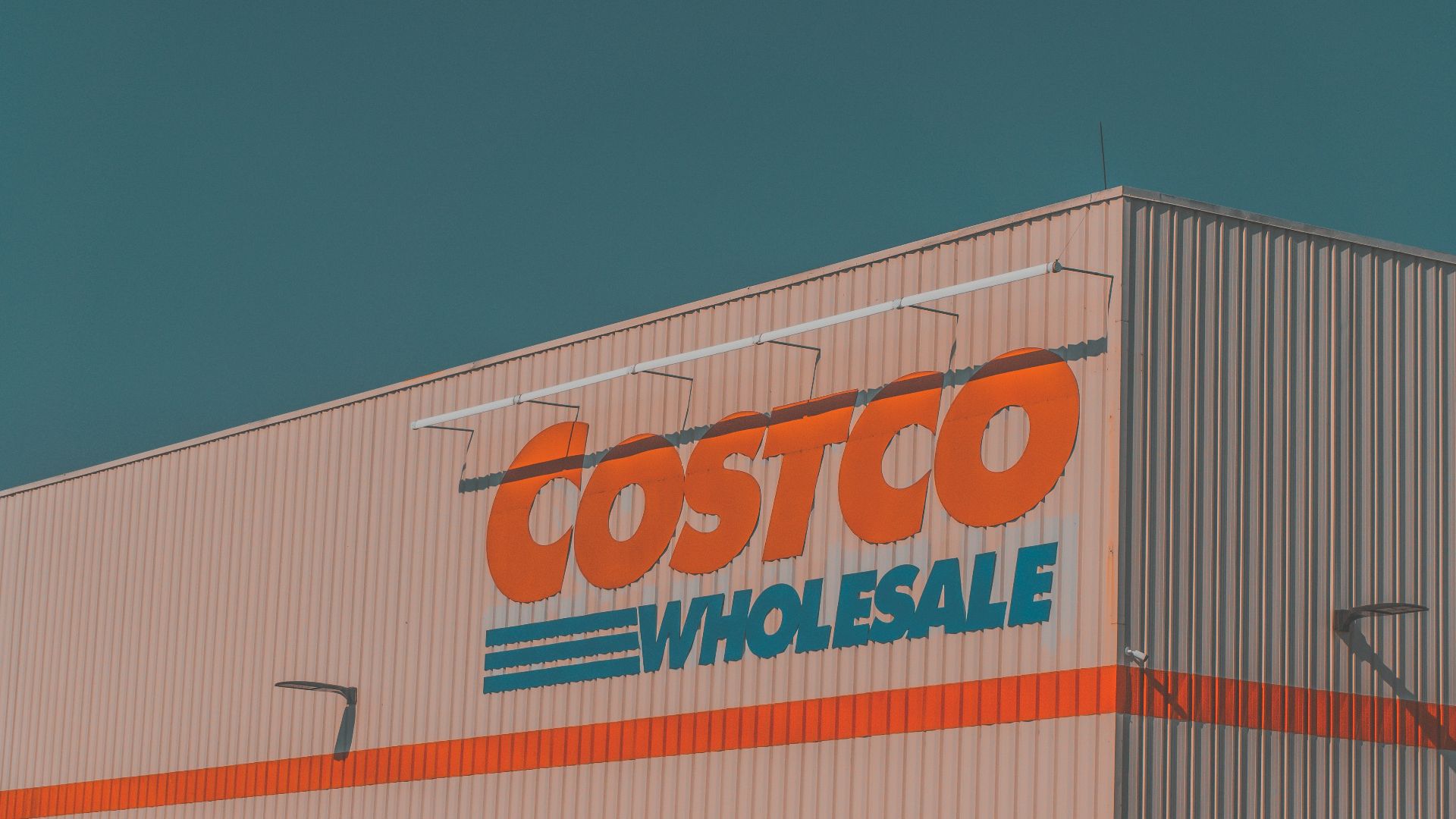 a building with a sign that says costco whole sale