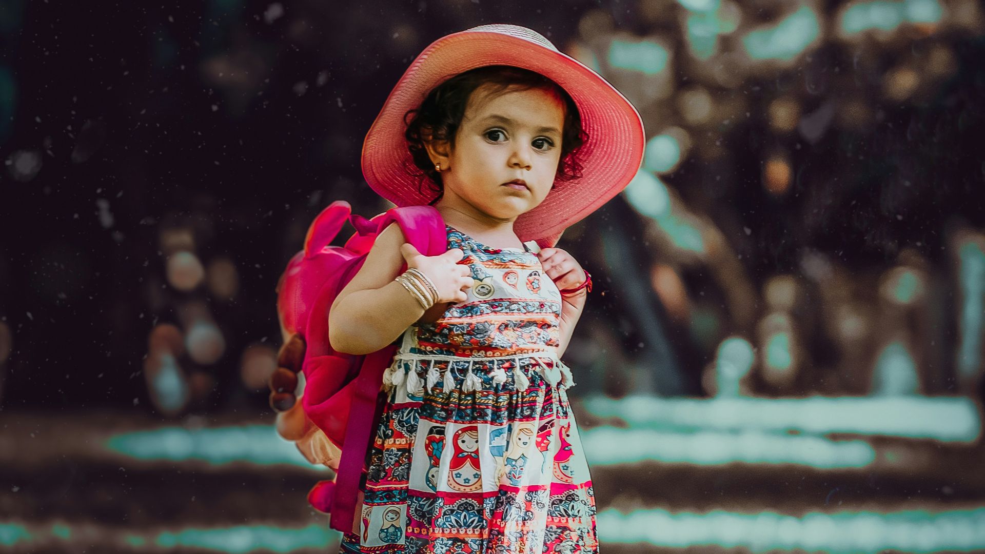toddler carrying backpack