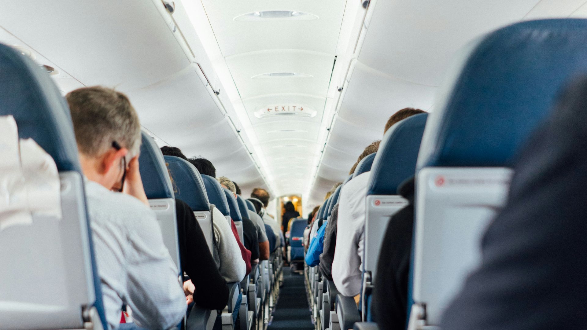 people sitting inside plane